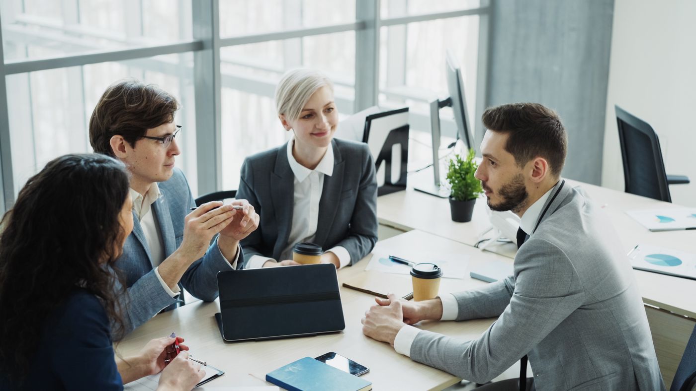 Colleagues working together in a bright modern office
